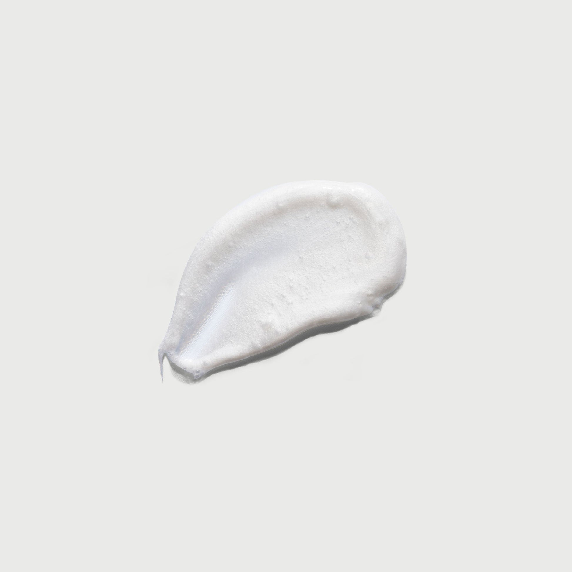 the-smoother-glycolic-acid-exfoliating-body-wash-g4 NATR-40002-Swatch-The-Smoother-Glycolic-Acid-Exfoliating-Body-Wash-bonebkgd.jpg