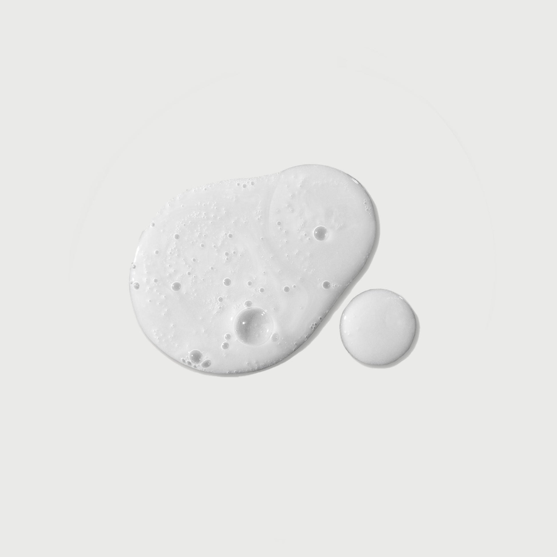the-purifier-niacinamide-serum-body-wash-n2 NATR-40012-Swatch-The-Purifier-Niacinamide-Serum-Body-Wash-bonebkgd.jpg