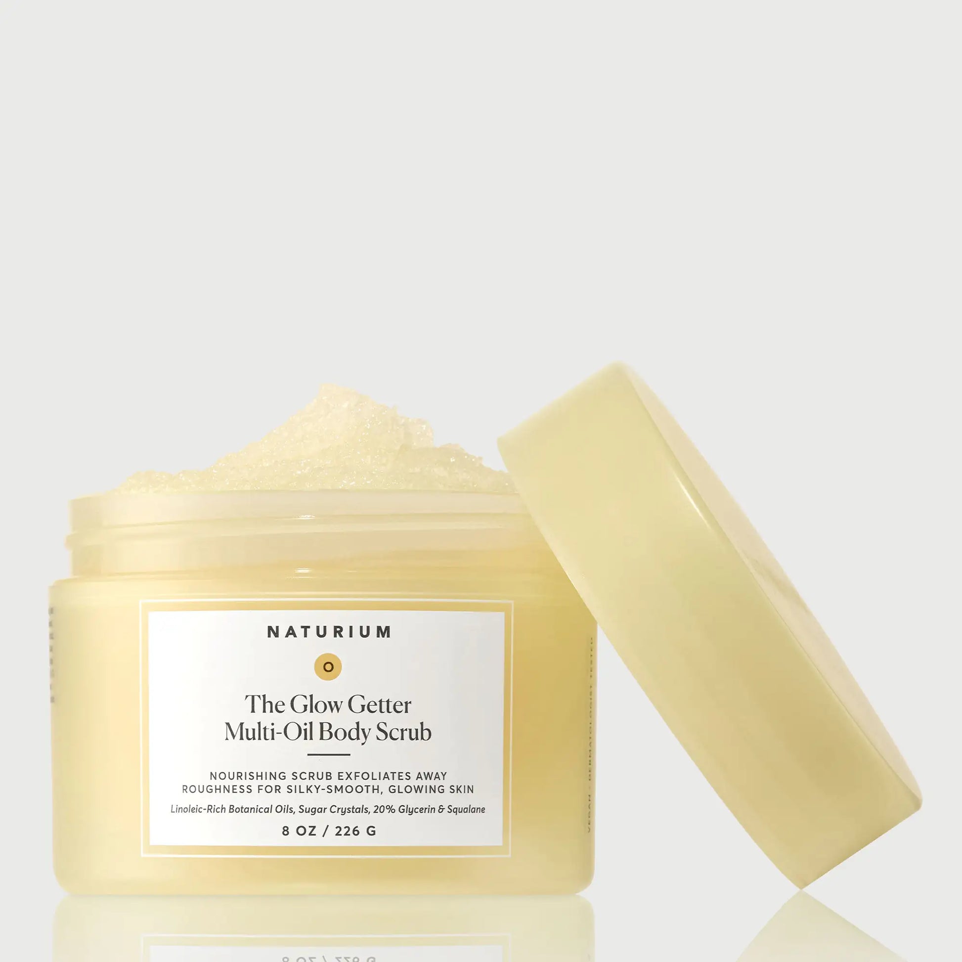 the-glow-getter-multi-oil-body-scrub-t4 NATR-40028-GlowGetter-Multi-Oil-Body-Scrub-Front-CapOff-bonebkgd.webp