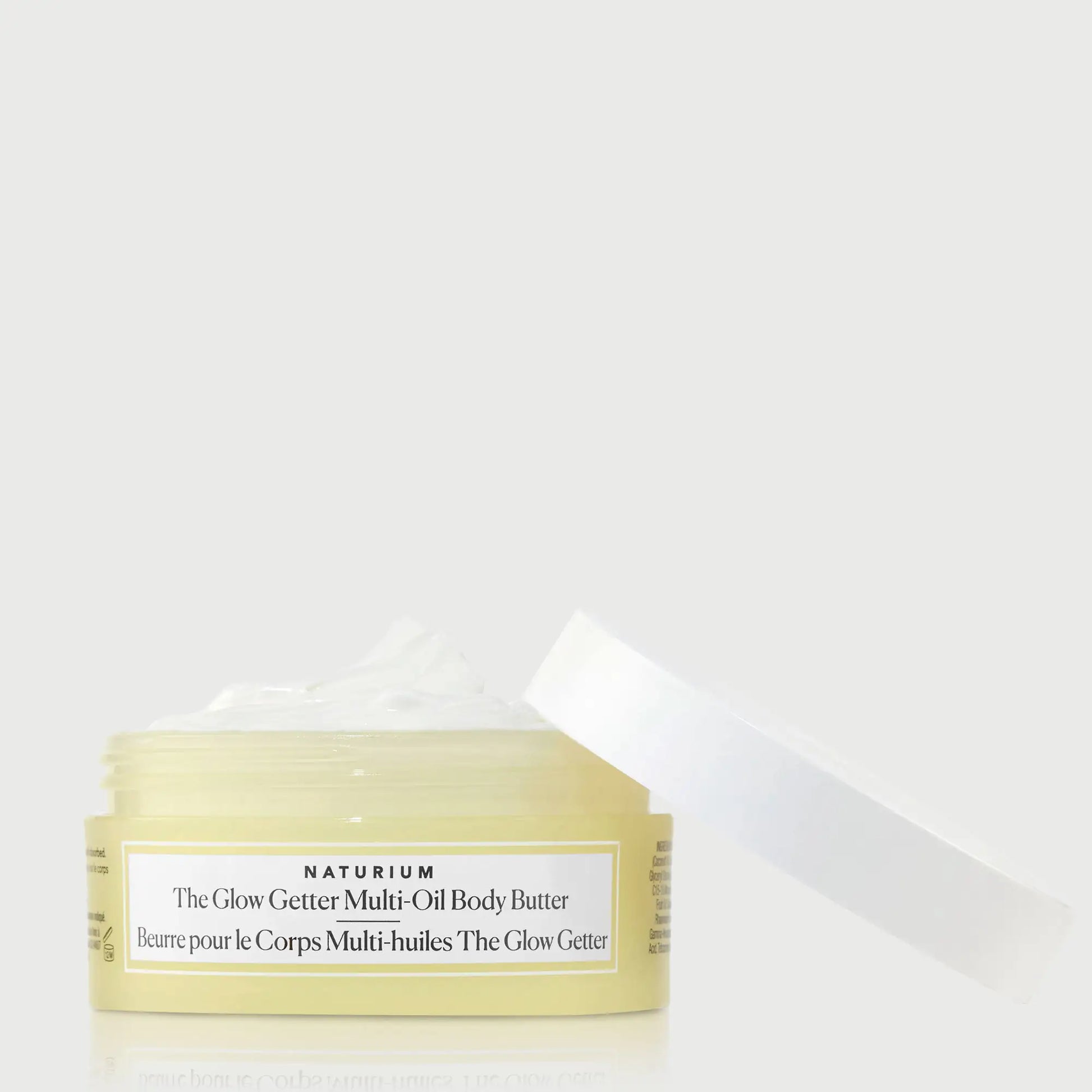 the-glow-getter-multi-oil-body-butter-travel-size-v6 NATR-40115_Glow-Getter-Body-Butter-Mini_front_capoff_bonebkgd.webp