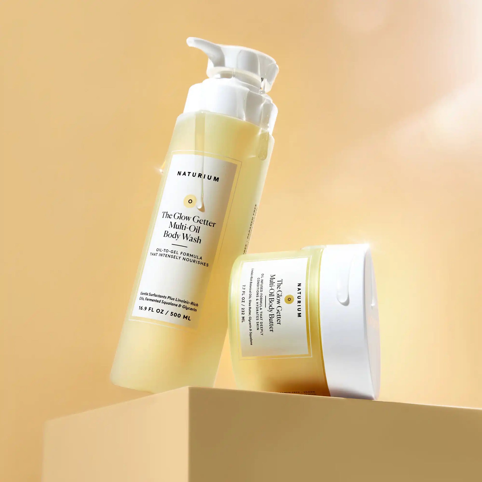 the-glow-all-out-body-bundle-v0 gg-bodybutter_1464-crop_revcolor_FL.webp